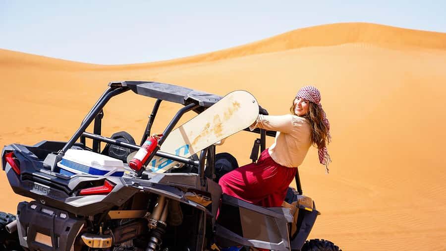 Dubai: Quad Bike, Dune Buggy, and Sandboarding Experience - Sandboarding on Red Dunes: Short Time, Big Feeling