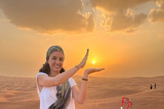 Dubai Red Desert Safari sharing basis with Camel, Shows & Dinner - Sandboarding at Sunset: Quick, Fun, and Very Dubai
