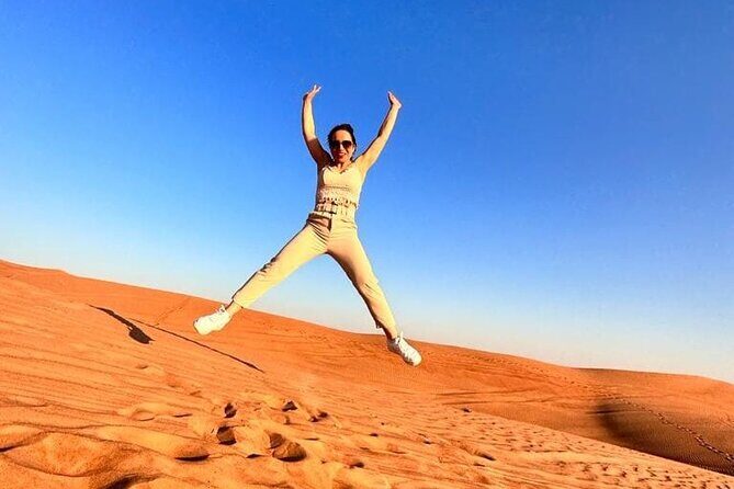 Dubai Red Desert Safari sharing basis with Camel, Shows & Dinner - Camel Ride for Photos and Henna: The Cultural Bits Without the Lecture