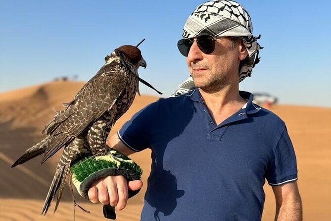 Dubai Red Desert Safari sharing basis with Camel, Shows & Dinner - Pickup, Licensed Guide, and the Shared-Safari Reality