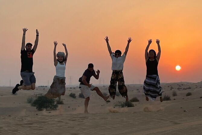 Dubai Red Dune Desert Safari Camel Ride Sandboard & BBQ Dinner - Sandboarding plus optional quad/buggy thrills
