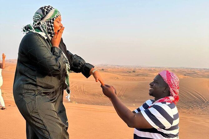 Dubai Red Dune Desert Safari Camel Ride Sandboard & BBQ Dinner - Price and value at about $41.87 per person