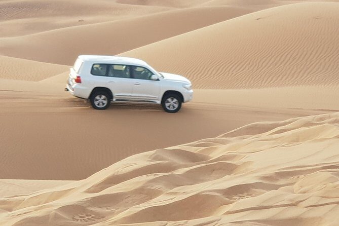 Dubai Red Dune Desert Safari, Sand Boarding, Quad Bike Ride - Sunrise photo stop: your best chance for real desert shots
