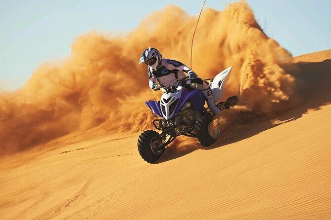 Dubai Red dune Desert Safari With Dune Bashing, Camel Ride & BBQ - Sandboarding: Sliding Down the Dunes Without Needing Tech Skills