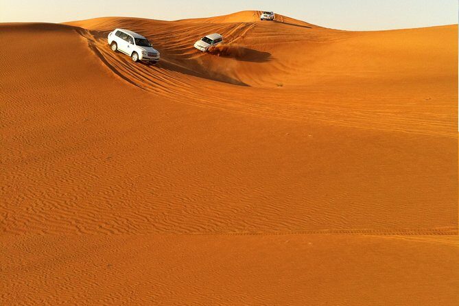 Dubai Red Dune Extreme Desert Safari Adventure With Sand Boarding - Getting Ready With Your Guide: The Meeting That Sets the Mood