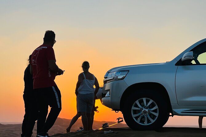Dubai Red Dunes Afternoon Desert Safari with Camel Ride - Dune bashing and sandboarding: the moment everyone starts smiling