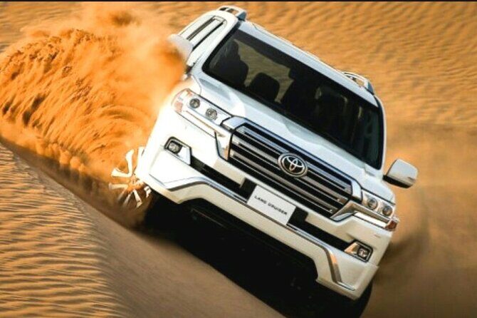 Dubai: Red Dunes Desert Safari, Camel ride, Sandboard, Quad Bike - Camel rides and sunset photos: The calmer side of the safari