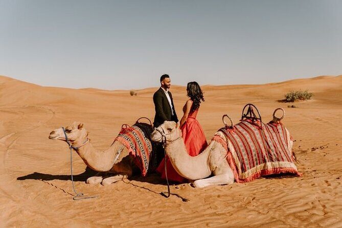 Dubai: Red Dunes Desert Safari, Camel ride, Sandboard, Quad Bike - Bedouin-style camp dinner, Tanura, Belly Dance, and shisha