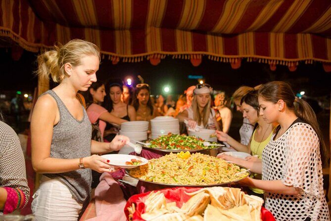 Dubai Red Dunes Desert Safari, With BBQ, Camel Ride, Sand Boarding And Much More - Desert Entertainment Package: Belly Dance, Tanura, and a Fire Show