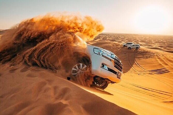 Dubai Red Dunes Desert Safari, With BBQ, Camel Ride, Sand Boarding And Much More - Lahbab Red Dunes Dune Bashing: Thrills, Timing, and Safety Moments