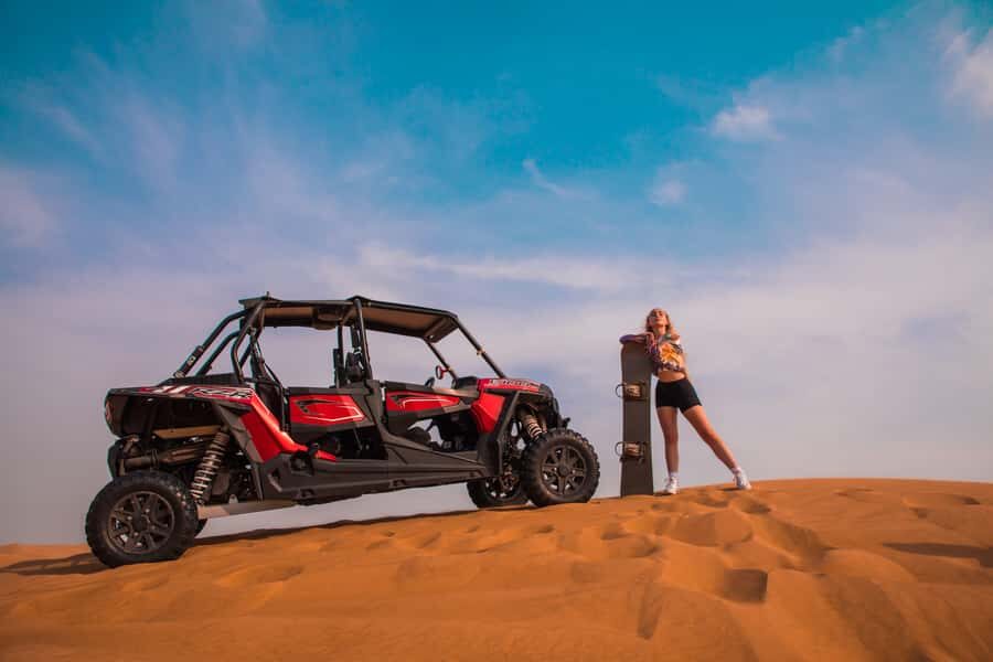 Dubai: Red Dunes Quad Bike, Dune Buggy, Camel & Refreshments - Entering Dubai’s Red Dunes: Quad Bike vs. Dune Buggy