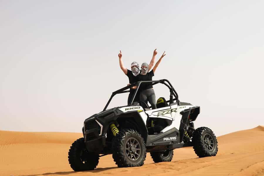 Dubai: Red Dunes Quad Bike, Dune Buggy, Camel & Refreshments - Camel Ride in Open Desert: Short, Classic, and Often the Favorite
