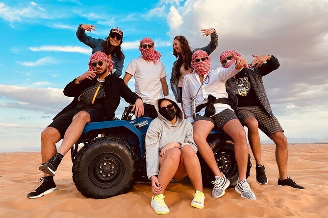 Dubai Red Dunes Quad Bike Tour,Sandboard, Camel ride & BBQ Dinner - From Central Dubai to Lahbab: the timing and ride style