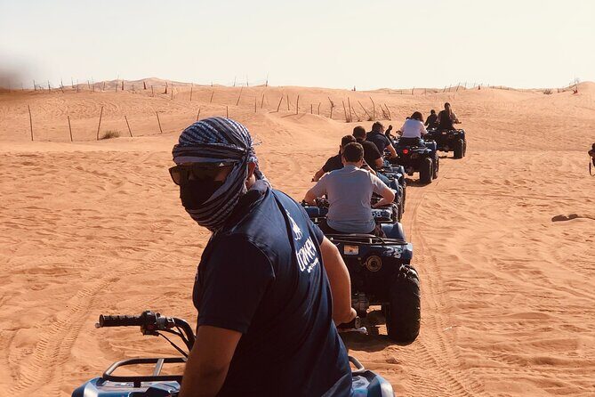 Dubai Red Dunes Quad Bike Tour,Sandboard, Camel ride & BBQ Dinner - Quad Bikes in the High Red Dunes: how the 60 minutes feels