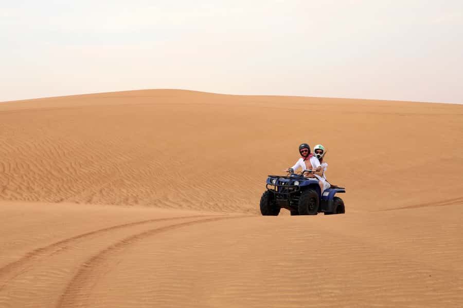 Dubai: Red Dunes Quad Bike with Sandboarding, Camels and BBQ - Price and value: why about $65 can feel fair here