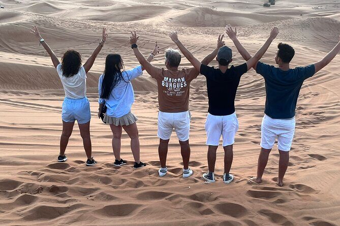 Dubai Red Dunes Safari, ATV, Camel ride, BBQ at Desert Camp - Lahbab: quad bike time, safety briefing, then dune bashing