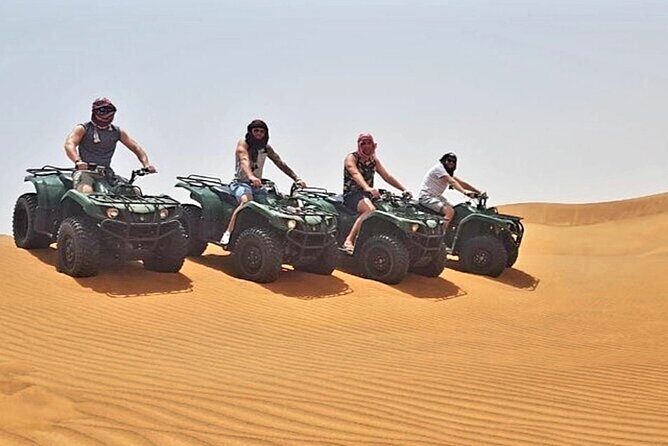 Dubai Red Dunes Safari, Camels, Live BBQ and Live Shows - Tanura, belly dance, and fire show: how to enjoy the night properly