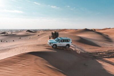 Dubai Red Dunes Safari: Dune Bashing, Camel Ride & Breakfast - Dune bashing in a long-wheelbase 4x4: fast, bumpy, and controlled