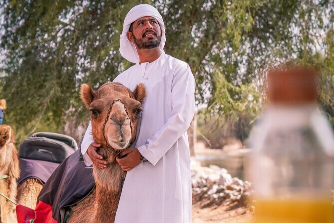 Dubai Red Dunes Safari: Dune Bashing, Camel Ride & Breakfast - Camel ride and sandboarding: how the tour balances slow and fast