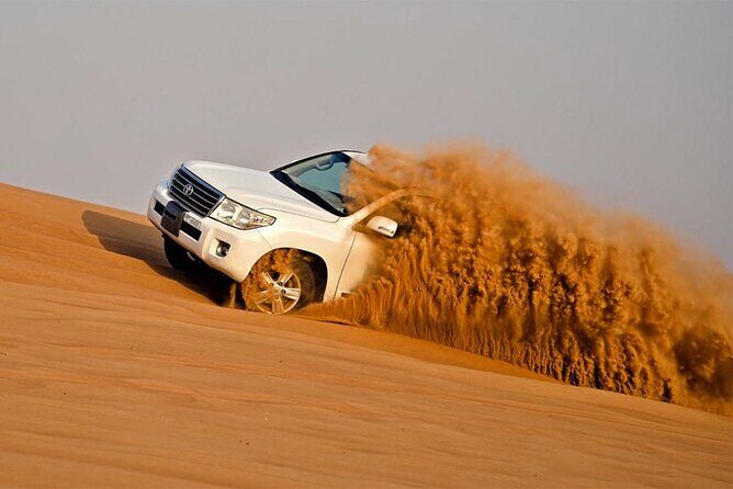 Dubai: Sandboarding, Camel Ride and Red Dune Bashing Safari - 4x4 Land Cruiser dune bashing: the part you’ll remember
