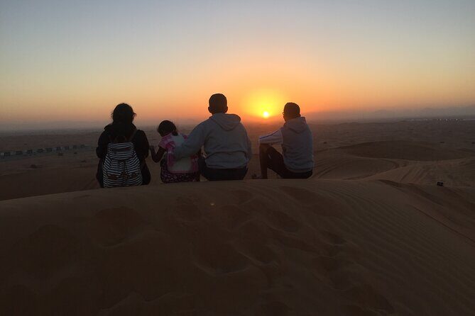 Dubai Sunrise Desert Safari Red Dune Camel Falcon & Sandboarding - Sandboarding on high red dunes: adrenaline with a natural stage