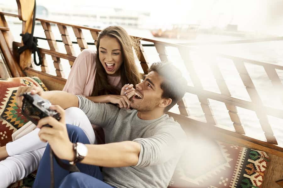 Dubai: Sunset Cruise on Traditional Boat & Emirati High Tea - Arriving at Dubai Festival City Mall and Getting on the Abra
