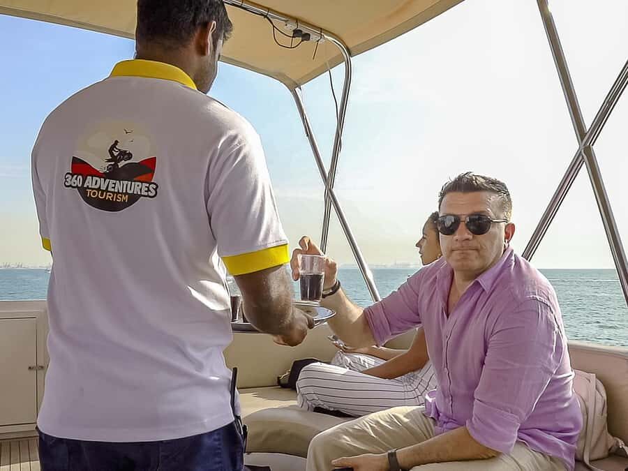 Dubai: The View At The Palm Ticket & 1.5 Afternoon Yacht - Onboard comfort: decks, AC lounge, drinks, and music