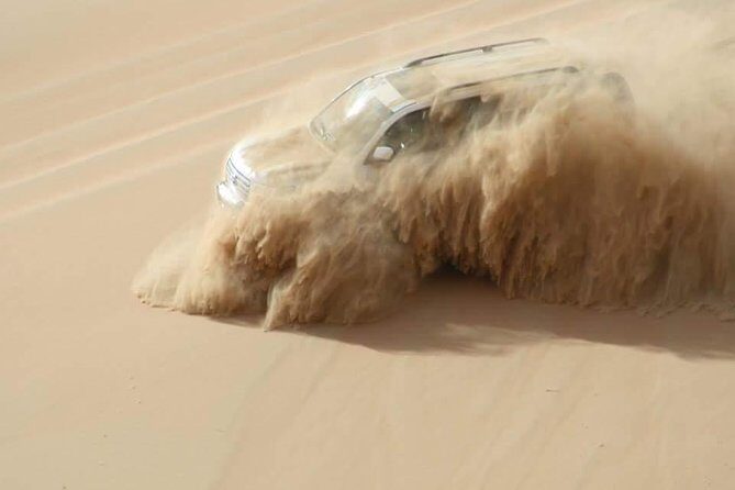 Dubai: Unique SUNSET 4WD Red Dunes Safari - Sandboarding + Camel Rides: Two Speeds Through the Dunes