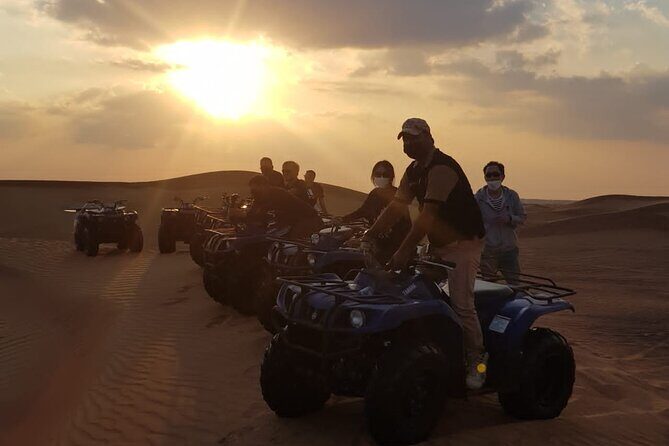 Dubai Unique Sunset Combo: 4WD and Quad Bike Red Dunes Safari - Live Entertainment at Camp: Belly Dancing, Folkloric Shows, and What Can Change