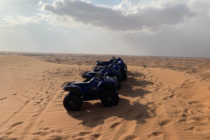 Dubai: Unique SUNSET Quad Bike Red Dunes Safari - Guides, group size, and why it affects your comfort