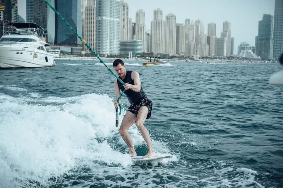 Dubai wakesurfing & wakeboarding: Snacks & drinks included! - What You Do On the Water: Wakesurfing vs. Wakeboarding Basics