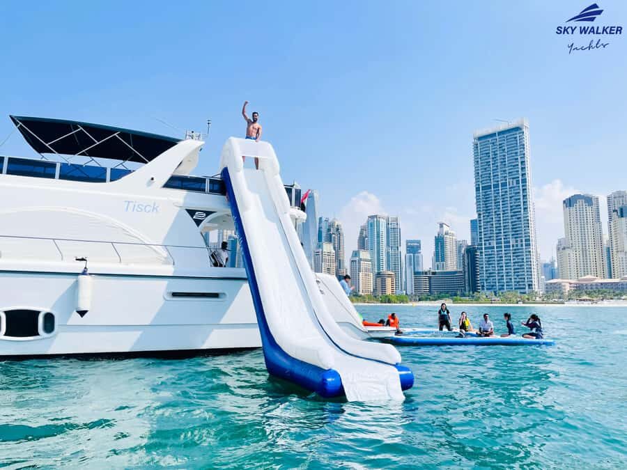 Dubai: Yacht Cruise with Swimming, Snorkeling and BBQ Lunch - Entering the Dubai Harbour Yacht Club: the easiest starting line