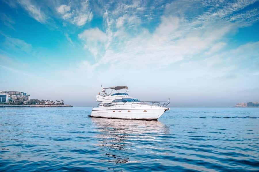 Dubai Yacht Tour - Boat Trip upto 12 guests Private event - The onboard experience: Wi‑Fi, towels, sound system, and a calm ride