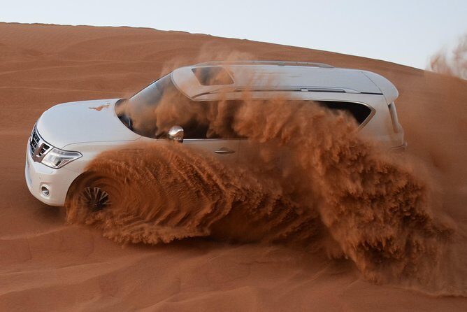 Dune Bashing and Buggy Self Drive from Dubai - Sand Boarding on the Red Dunes: Turning Views Into Action