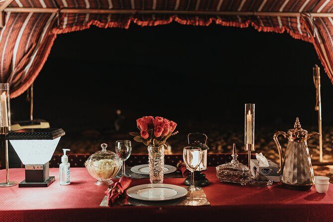 Dune Buggy Ride with Private BBQ Dinner in the Desert - Sand Boarding, Camel Ride, and Picture Stop at Sunset