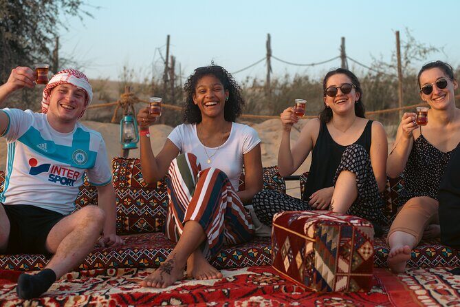 Evening Camel Caravan, Bedouin Dinner with Al Marmoom Oasis - Arabian Attire, Falcon Photos, and Bedouin Entertainment