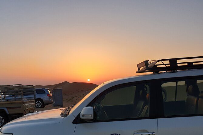 Evening Desert Safari Camel Ride BBQ live shows - Conquering the dunes: Dune bashing and sand boarding