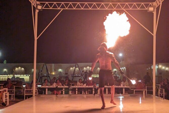 Evening Desert Safari Camel Ride Live Shows Shisha Dinner - Camp arrival: where sandboarding, camel rides, shisha, and henna happen