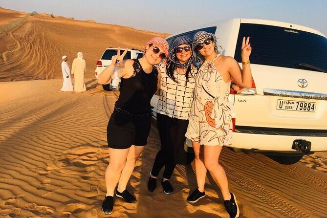 Evening Desert Safari from Dubai with Quad Bike Ride - Dune bashing and the high dune photo stop