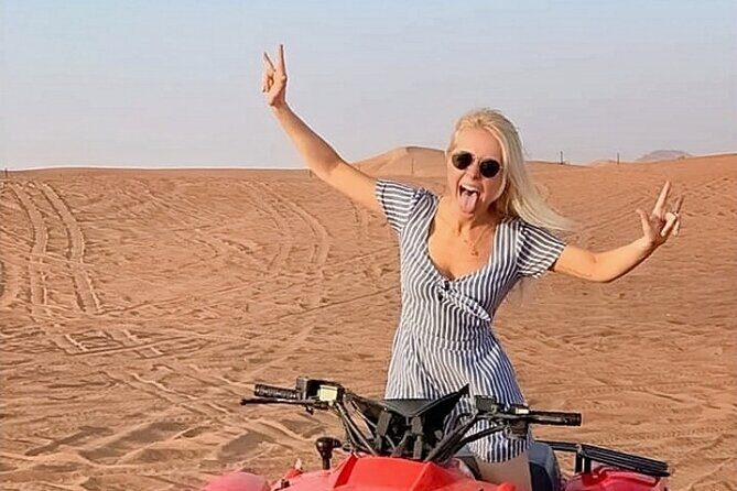 Evening Desert Safari from Dubai with Quad Bike Ride - Stage entertainment: belly dance, Tanura, and fire show