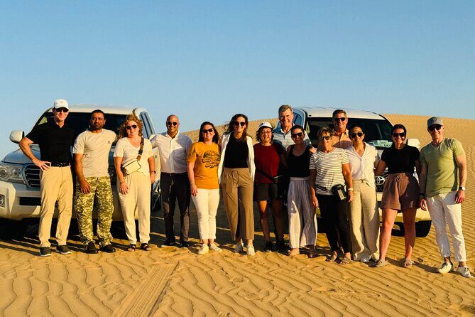 Evening Desert Safari Quad Bike and Live BBQ - Camp time: camel rides, sandboarding, and the sunset view