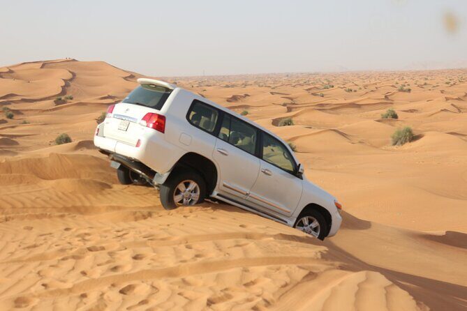 Evening Desert Safari Tour With Dinner & Entertainment - Hotel Pickup to Lahbab: Where the Evening Gets Set Up