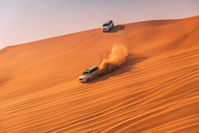 Evening Desert Safari with ATV Quad Bike Dune Bashing BBQ Dinner - Camel ride and sandboarding: the parts that slow the adrenaline