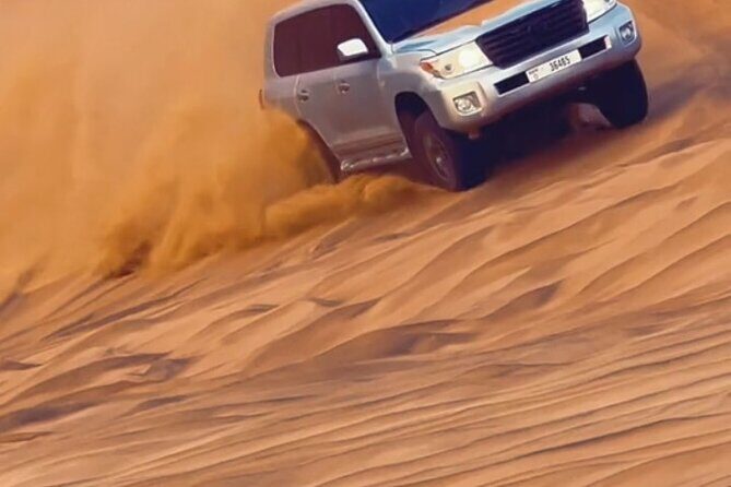 Evening Desert Safari with BBQ Buffet Camel Ride and Arabic Shows - Live Belly Dancing, Fire Show, and Tanoura: Night Entertainment That Actually Has Movement