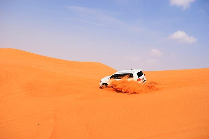 Evening Desert Safari with BBQ Dinner - Sahraa Al Badier: optional quad bikes and the refresh stop