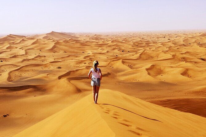 Evening Desert Safari with BBQ Dinner - Al Badayer red dunes: dune bashing, sunset photos, and sandboarding