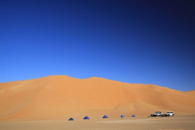 Evening Desert Safari with Belly Dance and BBQ Dinner and Camel Ride - Pickup and the ride out: what the Land Cruiser experience means