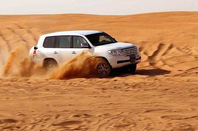 Evening Desert Safari with, Dune Bashing, Camel Ride, sand board - Sunset Photo Stops and Bedouin-Inspired Camp Time