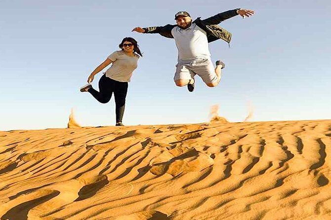 Evening Desert Safari with, Dune Bashing, Camel Ride, sand board - Guides Who Keep the Energy Fun and the Ride Organized