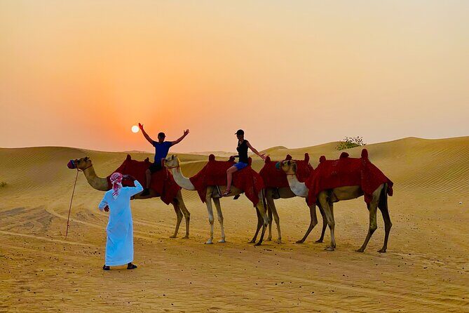 Evening Desert Safari with Dune Buggy Ride& BBQ Dinner–Shared Car - Sandboarding and camel riding: the “different than Dubai mall lights” part